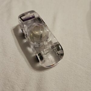 Clear Toy Car With A Ball On The Bottom. Unique And Different!